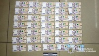 Викрав гроші просто з прилавка: Житомирські поліцейські затримали підозрюваного у грабежі